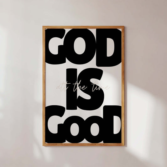 Framed poster with 'GOD IS GOOD' text on a light background