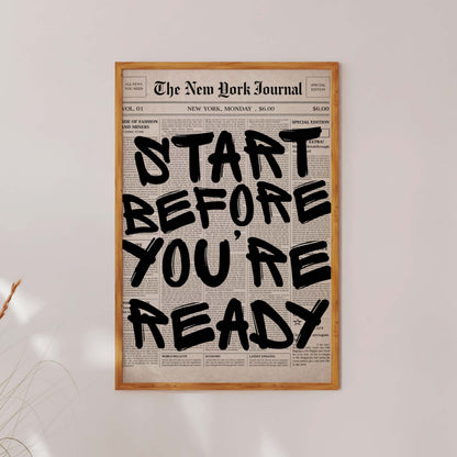 Framed poster with motivational quote 'Start Before You're Ready' on a white wall.