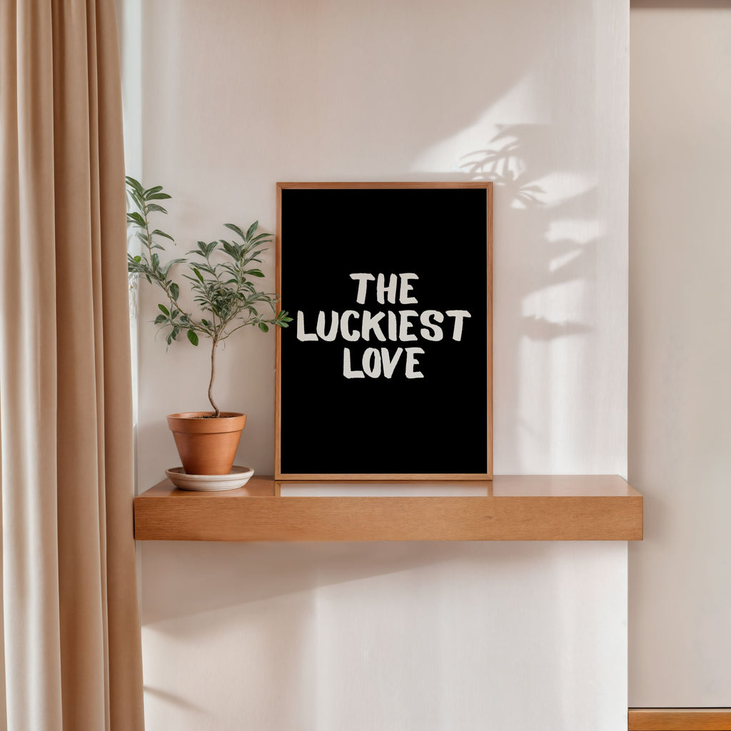 modern romantic quote poster the luckiest love black background wall art