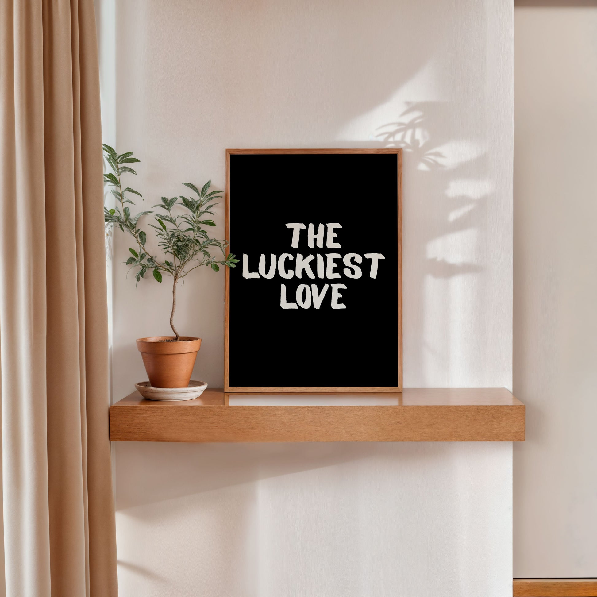 modern romantic quote poster the luckiest love black background wall art